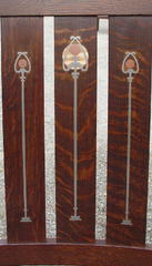 Close-up of the pewter, copper and curly maple inlay showing greater contrast between the inlay and the darker stain on this additional set.